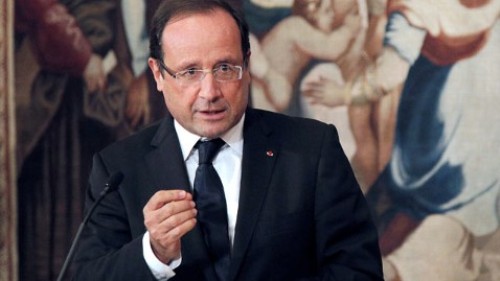 Tổng thống Pháp François Hollande đề xuất cấm học sinh làm bài tập về nhà - Ảnh: AFP