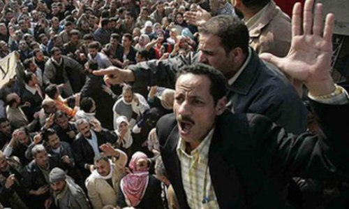 Khoảng 24.000 công nhân đã đình công tại công ty dệt may Misr hồi năm 2011 - Ảnh: AFP