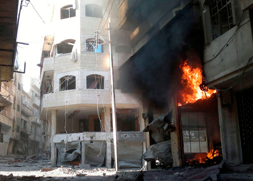 Khói lửa vẫn đang bao trùm Syria vì xung đột căng thẳng - Ảnh: Reuters
