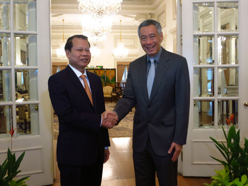 Phó Thủ tướng Vũ Văn Ninh và Thủ tướng Singapore Lý Hiển Long tại cuộc tiếp kiến sáng 7.11 - Ảnh: Thục Minh