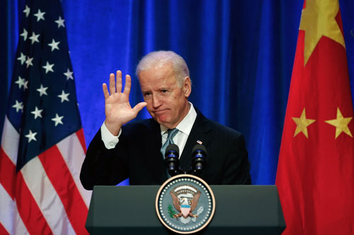 Phó tổng thống Joe Biden nói chuyện với giới doanh nhân Mỹ tại Bắc Kinh - Ảnh: AFP