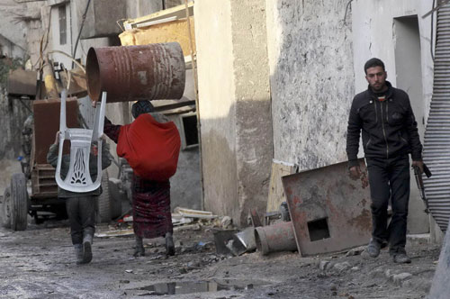 Dân thường Syria chạy nạn ở thành phố Aleppo 