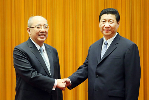 Ông Tập Cận Bình (phải) tiếp ông Ngô Bá Hùng tại Bắc Kinh 
