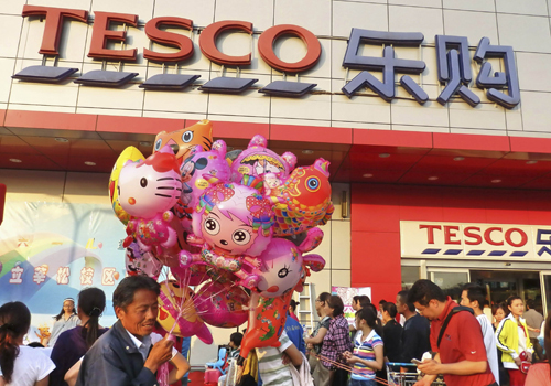 Tesco có thể phải rút khỏi thị trường Trung Quốc - d