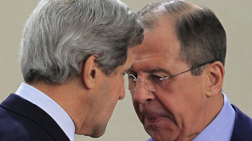 Ông Kerry (trái) và ông Lavrov trước cuộc họp tại Geneva - d