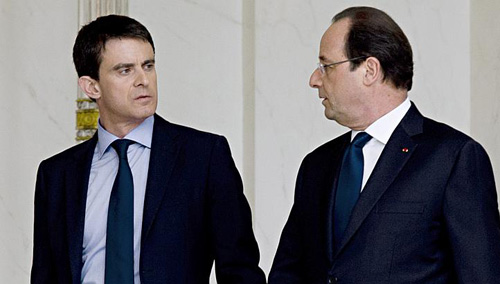 Tổng thống Pháp Francois Hollande (phải) và Thủ tướng Manuel Valls - Ảnh: AFP