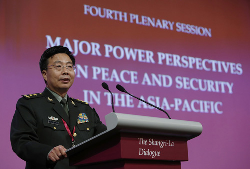 Ông Vương Quán Trung có bài phát biểu gây giận dữ tại Đối thoại Shangri-La  - Ảnh: Reuters