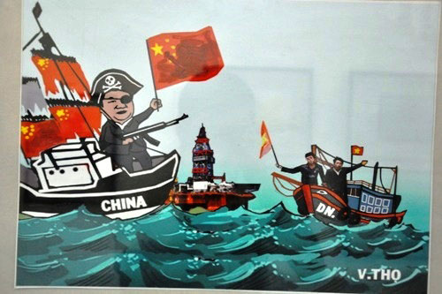 Đả kích giàn khoan Trung Quốc qua tranh biếm họa 1