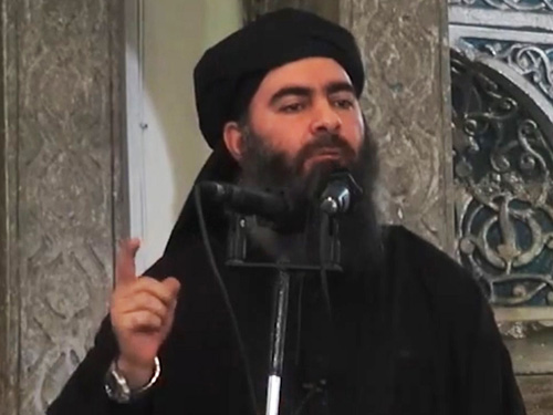 Thủ lĩnh IS Abu Abu Bakr al-Baghdadi trong một lần xuất hiện hiếm hoi - Ảnh: AFP