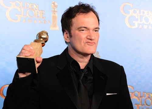Đạo diễn Quentin Tarantino nhận giải Kịch bản xuất sắc nhất cho phim Unchained tại Quả cầu vàng 2013 - Ảnh: AFP