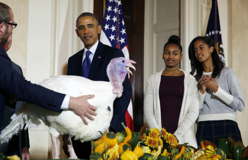 Tổng thống Obama trong ngày lễ Tạ ơn tại Nhà trắng - Ảnh: Reuters