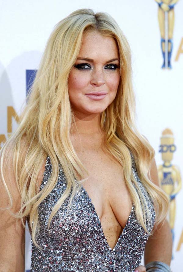 Lindsay Lohan bỏ Mỹ sang Anh mong bắt đầu lại 