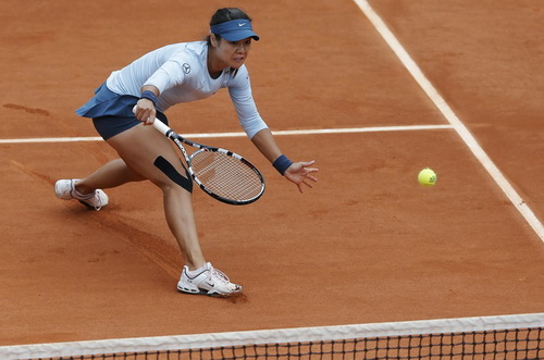 Li Na bất ngờ dừng bước ở vòng 2 giải Pháp mở rộng 2013
