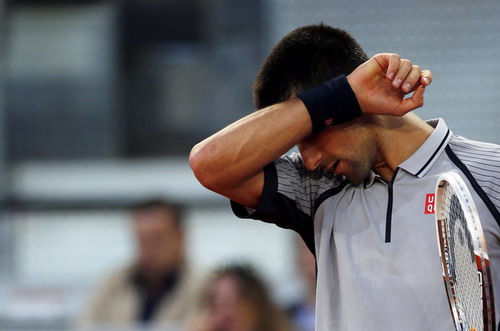 Djokovic gục ngã ngay tại vòng 2 Madrid Open 2013