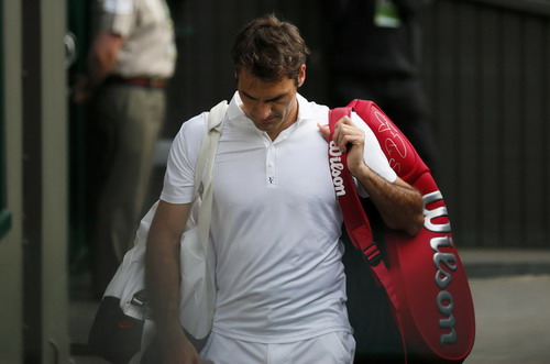 Federer nối gót Nadal rời Wimbledon 2013