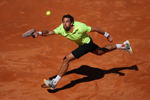 Federer bị loại sớm, Nadal chật vật vào vòng 3 Rome Masters