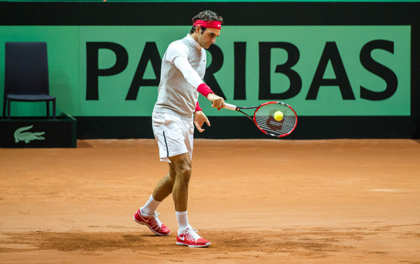 Federer đang chạy đua thời gian để kịp bình phục thi đấu trận đơn đầu tiên cho tuyển Thụy Sĩ - Ảnh: AFP