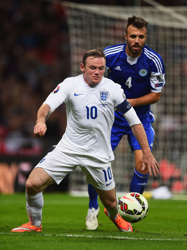 Rooney (trái) muốn có bàn thắng để kỷ niệm lần thứ 100 khoác áo đội tuyển Anh - Ảnh: AFP