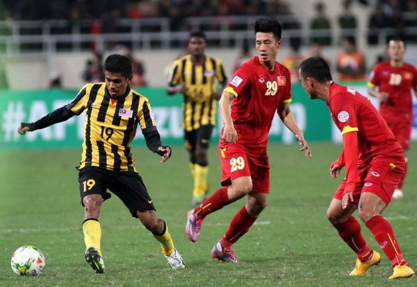 Tiền vệ Huy Hùng (29) là một trong những phát hiện ấn tượng nhất bóng đá Việt Nam năm 2014 - Ảnh: Khả Hòa