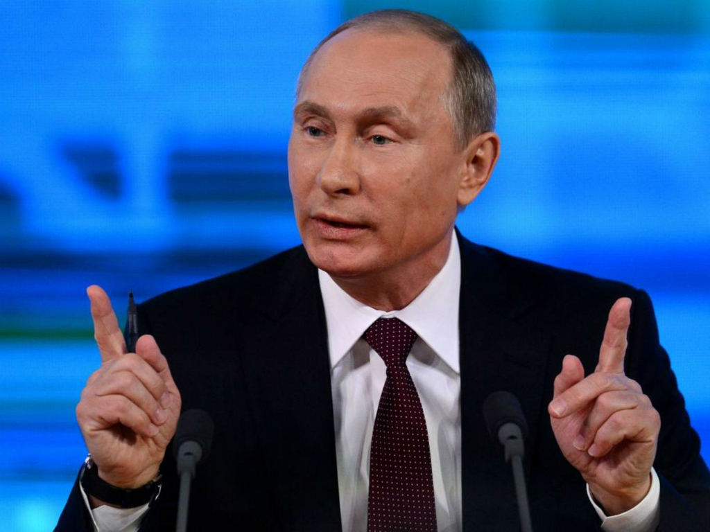 Tổng thống Putin nói bMỹ có liên quan đến việc lật đổ cựu tổng thống Ukraine năm 2014 - Ảnh: AFP