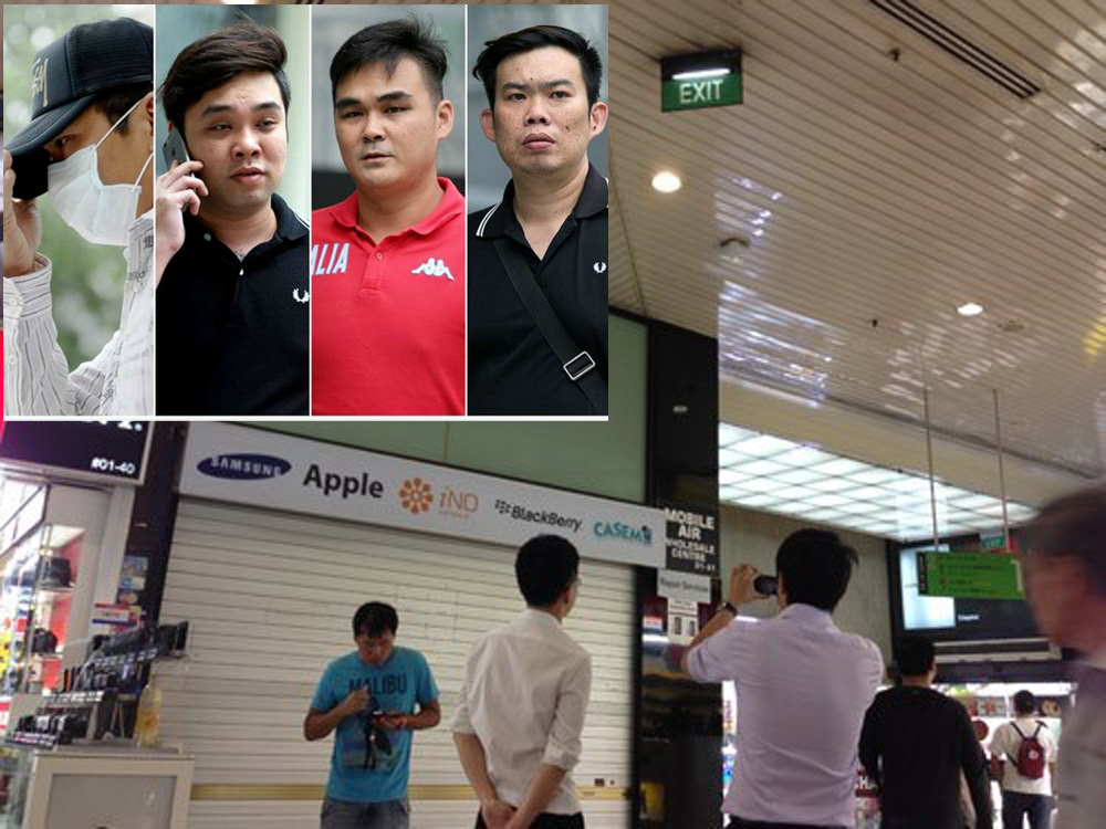 Ảnh nhỏ, từ trái sang: Bốn nhân viên cửa hàng điện thoại bị phạt tù: Koh Guan Seng, Kam Kok Keong, Lim Hong Ching và Kelvin Lim Zhi Wei. Ảnh Straits Times. Ảnh lớn: Cửa hàng Mobile Air bị đóng cửa - Ảnh: Minh Hoàng