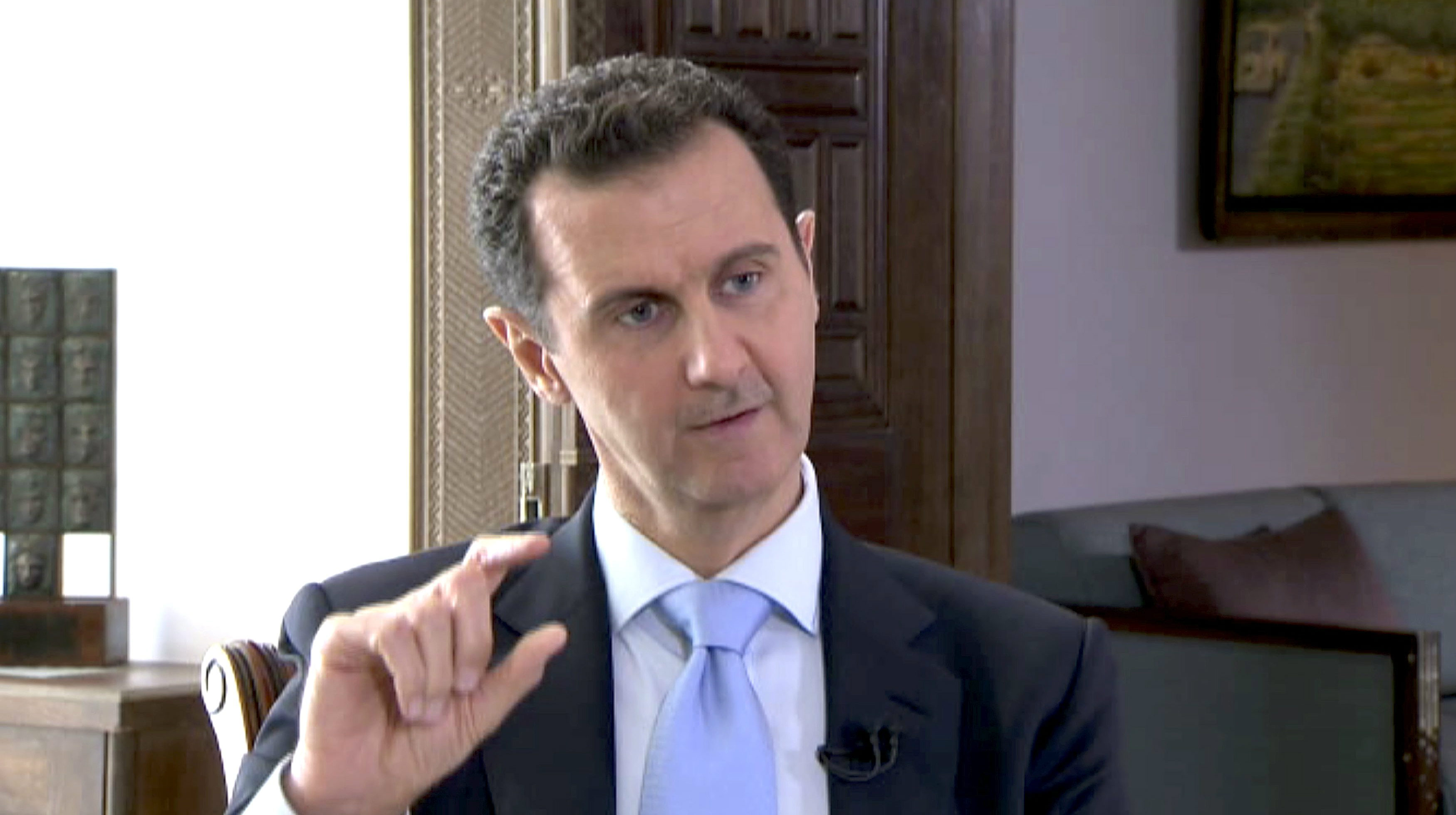 Việc ép Tổng thống Syria Bashar al-Assad ngồi vào bàn đàm phán về số phận của chính mình được cho là sẽ chỉ dẫn đến bế tắc - Ảnh: Reuters