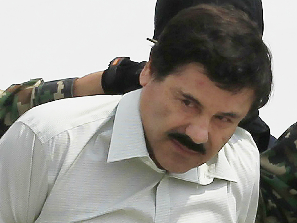 Trùm ma tuý Joaquin El Chapo Guzman trong một lần bị bắt giữ hồi năm 2014 - Ảnh: Reuters