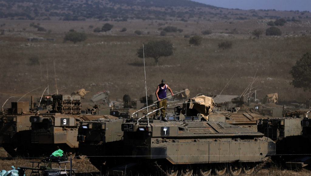 Binh lính Israel tại cao nguyên Golan - Ảnh: AFP