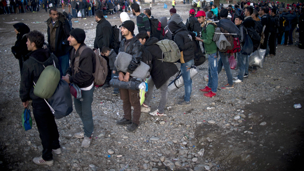 Người tị nạn trong một khu trại ở biên giới Hy Lạp - Macedonia - Ảnh: AFP