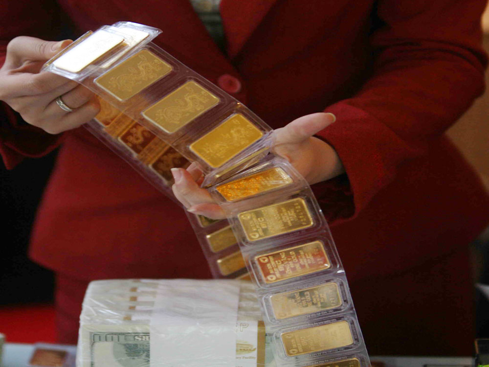 Giá vàng được dự báo tiếp tục xuống trong năm 2016 - Ảnh: Ngọc Thạch