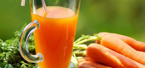 Nước ép cà rốt có tác dụng chống thoái hóa tế bào - Ảnh: Shutterstock