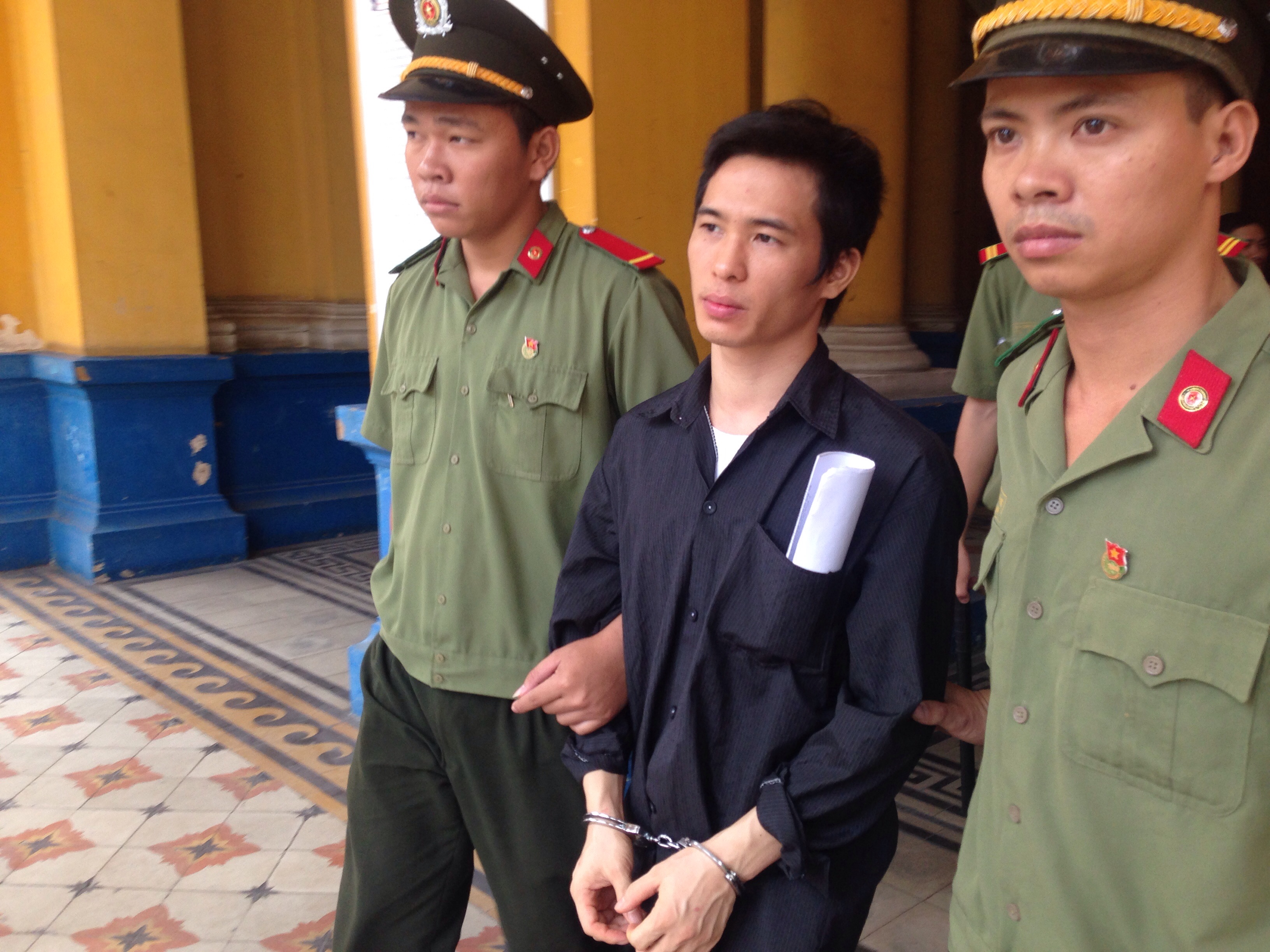 Hoàng Hải Trai bị dẫn giải về trại giam - Ảnh: Ngọc Lê