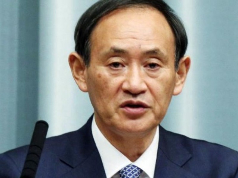 Chánh văn phòng Nội các Nhật, ông Yoshihide Suga - Ảnh: AFP