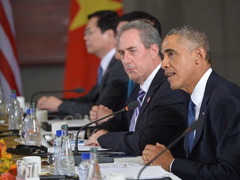 Tổng thống Mỹ Barack Obama phát biểu trước các đối tác tham gia TPP tại Toà đại sứ Mỹ ở Bắc Kinh ngày 10.11.2014 - Ảnh: AFP