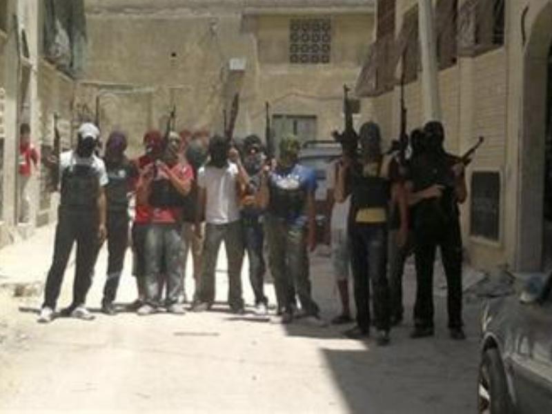 Các tay súng phe nổi dậy ở Syria - Ảnh: Reuters