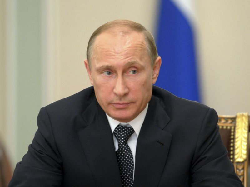 Điện Kremlin cáo buộc "Hồ sơ Panama" là một âm mưu nhắm vào Tổng thống Putin trước cuộc bầu cử - Ảnh: Reuters