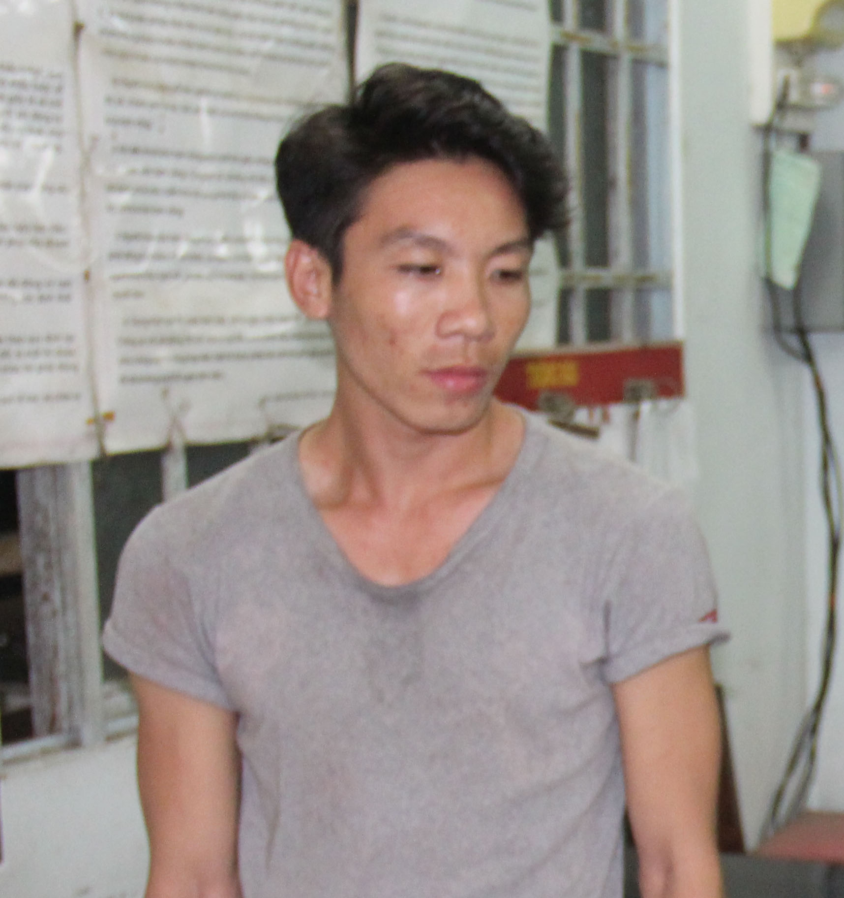 Khưu Văn Minh lúc bị bắt giữ - Ảnh: Thanh Đức