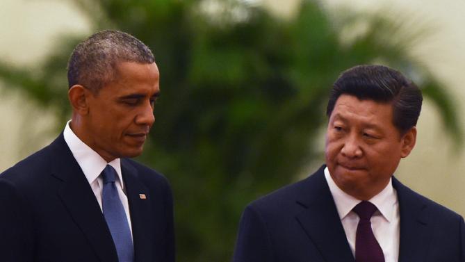 Ông Obama và ông Tập trong cuộc gặp tại Bắc Kinh (Trung Quốc) cuối năm 2014 - Ảnh: AFP