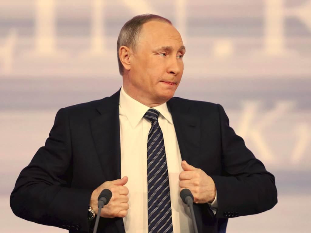 Tổng thống Nga Vladimir Putin nói Nga không bao giờ chịu “vẫy đuôi luồn cúi” - Ảnh: Reuters