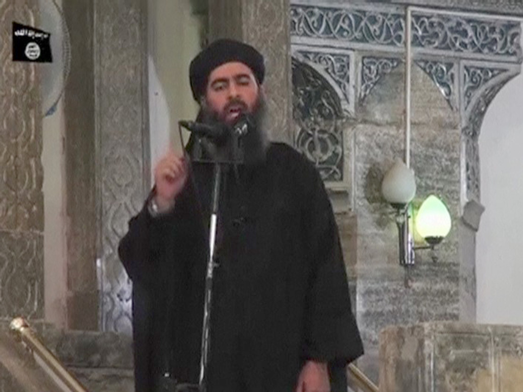 Thủ lĩnh IS, Abu Bakr al-Baghdadi trong bức ảnh chụp năm 2014 - Ảnh: Reuters