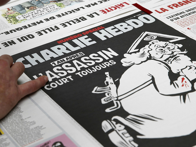 Vatican phê phán bìa số báo đặc biệt nhân kỷ niệm một năm ngày toà soạn Charlie Hebdo (Pháp) bị tấn công - Ảnh: Reuters
