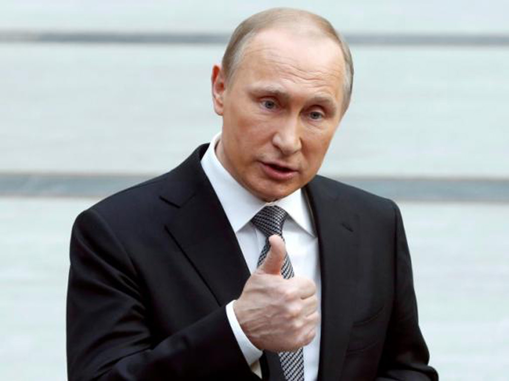 Tổng thống Vladimir Putin trả lời báo chí sau buổi giao lưu truyền hình trực tiếp tại Moscow ngày 14.4.2016 - Ảnh: Reuters