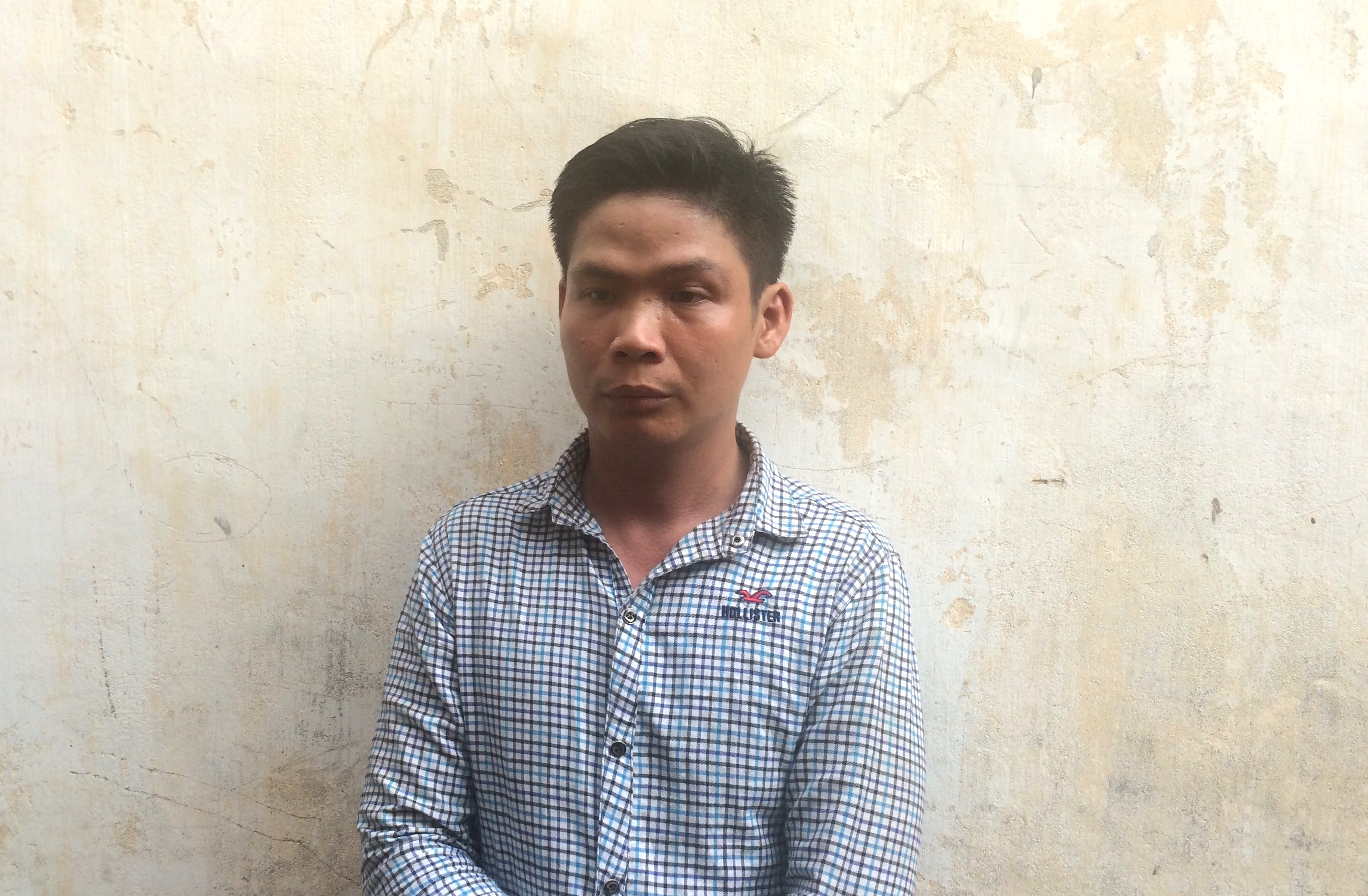 Nguyễn Tuấn Anh tại cơ quan công an - Ảnh: Phạm Hữu