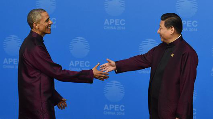 Cái bắt tay giữa 2 nhà lãnh đạo Mỹ-Trung lần này sẽ chứa đựng lắm gai góc - Ảnh: AFP