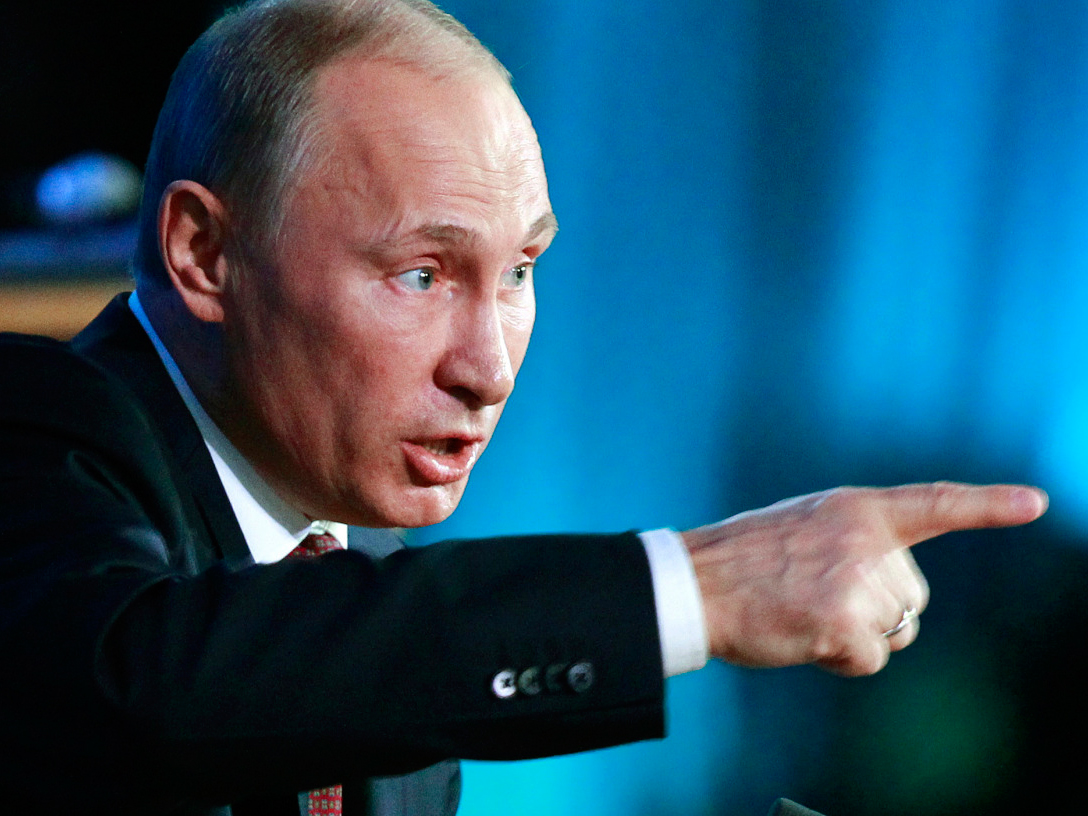 Tổng thống Nga Putin bảo Mỹ nên bắt tay với Nga để hợp pháp hóa hành động quân sự của Mỹ ở Syria - Ảnh: Reuters