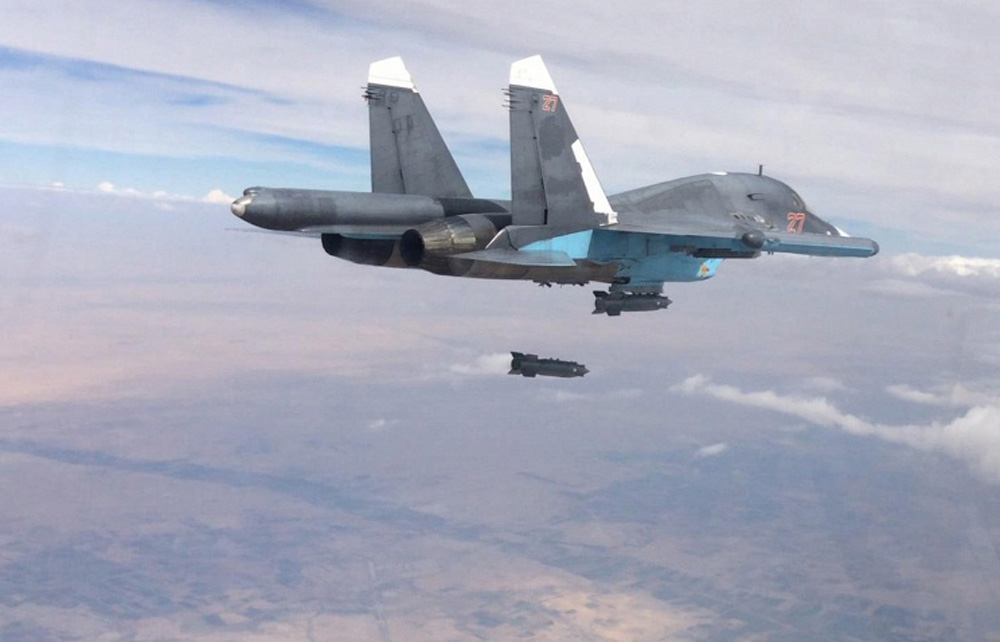 Máy bay Nga đang ném bom ở Syria - Ảnh: Reuters