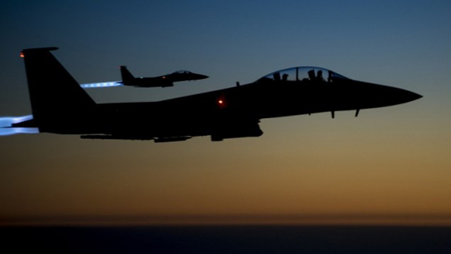 Hai chiếc F-15E Strike Eagle của Mỹ trở về căn cứ ở Iraq sau một đợt không kích ở Syria - Ảnh: AFP