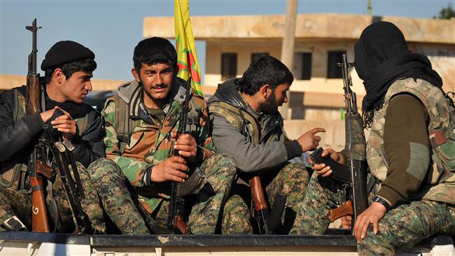 Lực lượng nổi dậy người Kurd ở Syria được Mỹ ủng hộ nhưng Thổ Nhĩ Kỳ chống đối - Ảnh: AFP