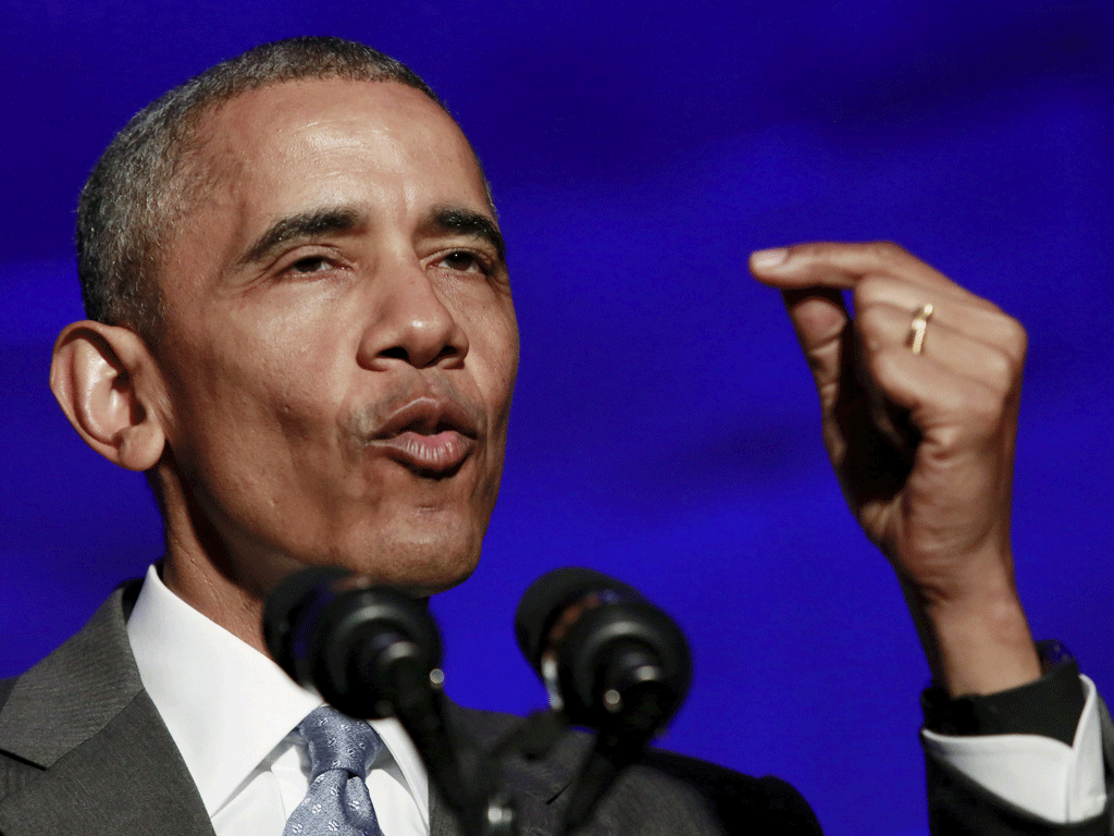 Tổng thống Obama than phiền đi đâu ông cũng bị "hỏi thăm" về chính trường Mỹ - Ảnh: Reuters