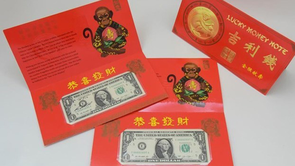 Tiền USD dát hình khỉ trên bao lì xì